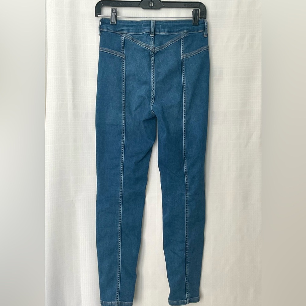 We The Free medium wash Skinny Jeans with unique back side stitching